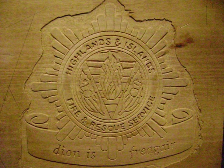 Carved emblem