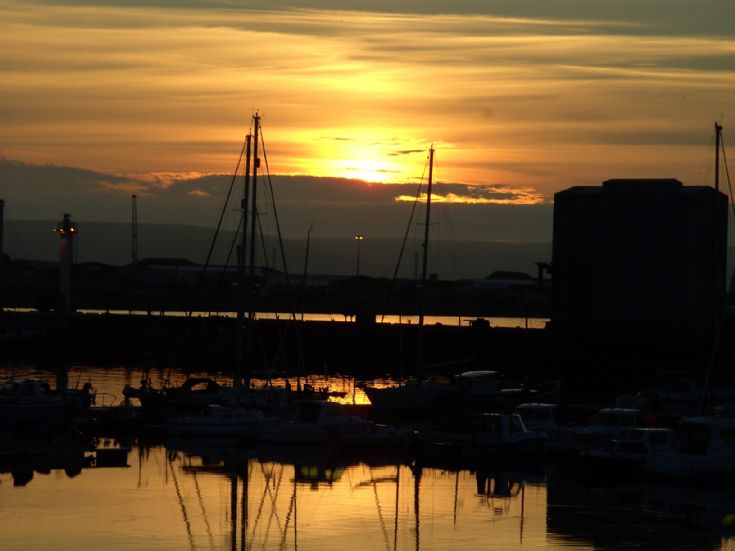 Sunset over Kirkwall marina