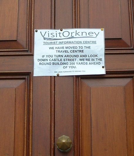 Sign on door of old tourist office
