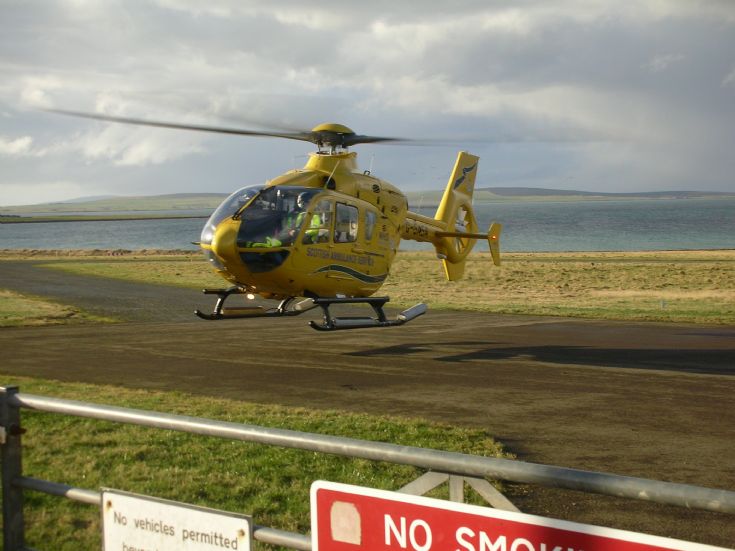 Ambulance helicopter at Stronsay Airfield.