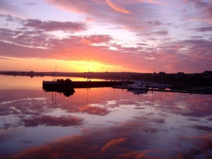 Sunrise over Kirkwall marina