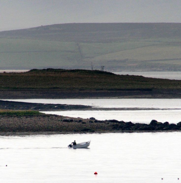 A dinghy by the Holms, by Stromness