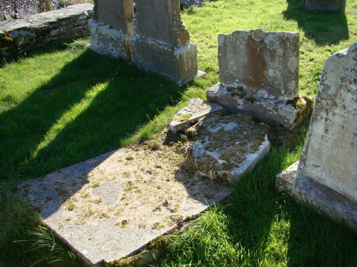 Fallen headstone at kirkyard, Burwick.