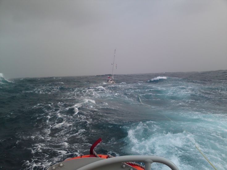 Kirkwall lifeboat towing yacht to safety