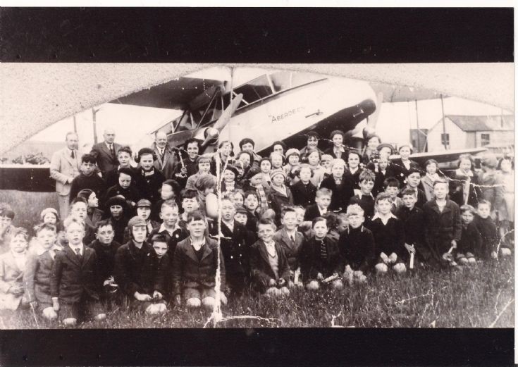 Schoolchildren and plane