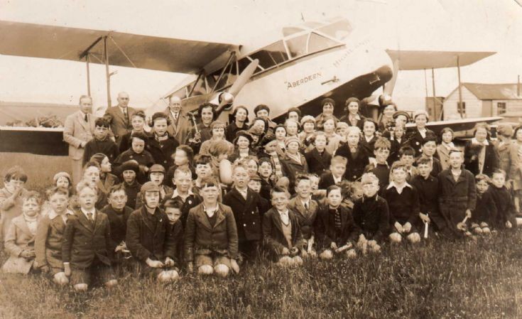 Schoolchildren and plane