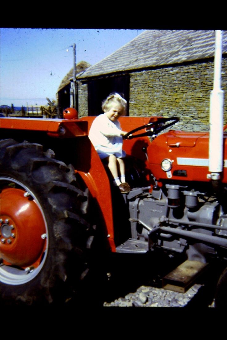 Mystery tractor driving bairn