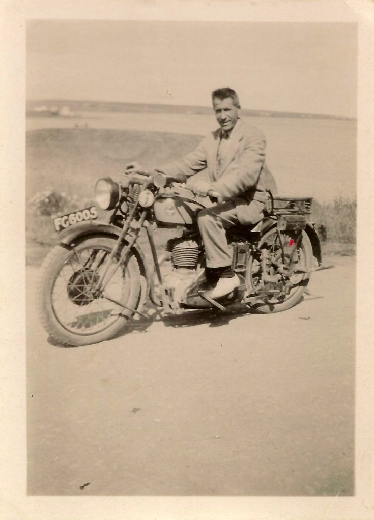 Mystery gentleman on a motorbike