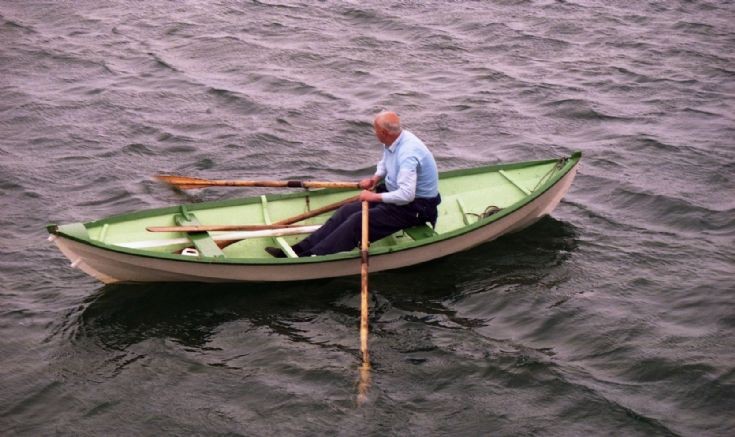 Mystery oarsman, mystery boat