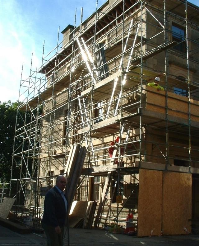 Hydro building scaffolded